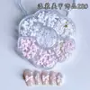 Caja de Flor de Ciruelo con Lazos de Perla, Flores de Dibujos Animados, Pedrería Mixta para Uñas, Decoraciones Brillantes para Uñas, Decoraciones Mixtas al por Mayor