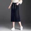 Falda midi de mezclilla simple y elegante para mujer, nueva colección otoño 2026, de cintura alta, que cubre la cadera, fluida, corte recto, adecuada para el trabajo