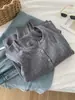 Suave y delicado cárdigan de punto fino de canalé de terciopelo Andy para mujer, otoño/invierno 2026, elegante y estilizado, con chaqueta de punto de cuello tijera