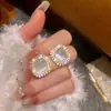 Pendientes Vintage Estilo Francés con Ojo de Gato Incrustado de Diamantes y Perlas, Pendientes de Lujo Ligero de Gama Alta, Exquisitos y Modernos Accesorios para Orejas Versátiles al por Mayor