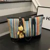 Bolso de Playa con Bloques de Color Rayas de Moda Tejido de Paja Colgante 2026 Estilo Coreano Elegante Nuevo Patchwork Veraniego