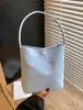 Bolso Cubo Coreano de Mano 2026 Nuevo Color Sólido Bolsa de Regalo Versátil Moda Nicho Bolso de Hombro para Estudiante