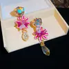 Nuevos pendientes de estilo transfronterizo europeo y americano con pasador de plata, incrustaciones de diamantes y diseño floral con esmalte al aceite, pendientes vintage de nicho, sensación de lujo ligero y alta gama para mujer