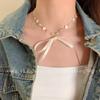 Collar con colgante de lazo dulce Qingmeng Piaolian para mujer, nueva moda 2024, cadena de clavícula de nicho que combina con todo.