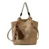 Bolsa de Ombro Feminina Moda Estilo Europeu e Americano 2025 Outono e Inverno Nova Bolsa de Ombro Casual Bolsa Tote com Rebites Bolsa de Mão com Franjas