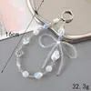 Ins Nuevo Colgante de Llavero con Lentejuelas y Lazo de Perlas para Funda de Teléfono Móvil Accesorios de Correa de Muñeca para Lanyard de Teléfono Móvil