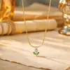Moderna e luxuosa, esta colorida corrente de aço titânio com tulipas de diamante é uma peça delicada e única com um estilo doce e charmoso.. É um novo design floral que complementa qualquer look e é perfeito como uma corrente para a clavícula.
