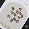 Nuevo estilo de celebridad de Internet: uñas con forma especial de champán y base puntiaguda, diamantes de imitación súper brillantes en forma de corazón, joyería para uñas DIY.