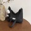 Bolso tote moderno de gran capacidad para mujer, nueva colección 2026, elegante diseño a rayas, estilo japonés, bolso de hombro simple y dulce