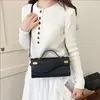 Ruien 2026 Nova Bolsa de Mão Texturizada Retrô Moda Bolsa Baguete Feminina Bolsa Transversal para o Dia a Dia