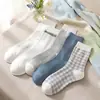 Meias de algodão puro para mulheres, fofas, respiráveis, absorventes de suor, resistentes a odores, meias de algodão de comprimento médio, estilo coreano para primavera e outono, estilo universitário, meias de algodão Xinjiang estilo folgado