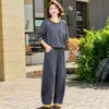 Conjunto estiloso e moderno de blusa de gola redonda e calça para mulheres de meia-idade, coleção primavera/outono 2026, novo look casual para senhoras elegantes