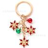 Llavero navideño de aleación con diseño de copo de nieve creativo, colgante de campana, regalo de Navidad, joyería transfronteriza europea y americana