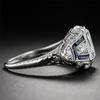 Anel Zhenrong ebay mais vendido com topázio azul incrustado Anel de noivado criativo de todas as flores com diamantes simulados para mulheres europeias e americanas