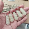 Venta al por mayor de fábrica colgante de calabaza de jade afgano blanco colgante de frijol de jade colgante de anillo de flor azul antiguo colgante de jade de tarjeta de nada
