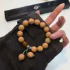 Pulsera y collar con cuentas de Buda Bodhi de múltiples círculos, de Nepal, con ojos de fénix, color rojo y amarillo, original de la ecología, ideal para hombres y mujeres.