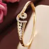 Suministro Exclusivo Transfronterizo de Pulseras de Acero Titanio con Diseño Espiral Hueco y Diamantes Completos, Pulseras Exquisitas y de Alta Gama para Mujer, Venta Directa del Fabricante
