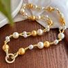 Otoño e Invierno Maillard Vintage Guofeng alta calidad Shijia Zhengyuan Cadena Fuerte de Luz Perla Clavícula Collar de Doble Capa