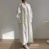 Enviado desde Dongdaemun, Corea del Sur, nuevo vestido camisa casual de estilo nicho de otoño para mujer falda larga 17969