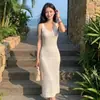 Vestido camisola retro elegante de dama estilo coreano, estilo Hong Kong, de seda helada, hueco, teñido anudado, vestido largo dulce y picante, suave y femenino