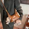Bolsa de Nicho Feminina 2025 Nova Moda Outono e Inverno Popular de Ombro de Luxo Bolsa de Mão Transversal Bolsa Bolinho