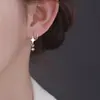 Pendientes de Estrella de Circonita Dulces y Frescos Versión Coreana Moda de Comercio Exterior Europeo y Americano Diseño Creativo Pendientes de Estrella de Cuatro Puntas Giratorios