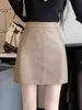 Falda de cuero negro para mujer en otoño e invierno, cintura alta, delgada y versátil, falda A de cadera, falda corta de cuero pu mate pequeña y a la moda