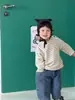 Camiseta Rayada para Niños Otoño 2026 Nuevo Estilo Ropa de Otoño para Bebé Estilo Coreano Ropa para Niños Conjunto de Jeans para Niños de Otoño