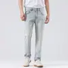 Ropa de Hombre Xintang Estilo Americano Magnolia Blanca Verano Nuevo Estilo Jeans Acortados Ajustados Pierna Recta Venta al por Mayor.