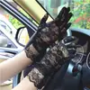 Guantes de verano de encaje encaje sexy calados etiqueta de boda viaje resistentes a los rayos UV transpirables guantes finos para mujer