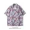 Cuello de solapa 2026 Estilo nuevo Camisa floral para hombre Estilo coreano Holgada Moda Estampada Estilo playero Casual Camisa de manga corta Exportación