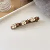 2026 Nova Tendência Flor de Camélia Ferramenta Preguiçosa para Penteado Grampo de Cabelo Estiloso para Franja e Cabelo Lateral