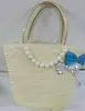 Bolso de paja de fábrica lote mixto bolso de paja de trigo artesanías tejidas con plantas bolso con lazo de perlas bolso de playa