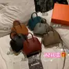 Bolsa con Carcasa de Piel de Oveja 2026 Nueva de Nicho de Gama Alta para Bolos Bolso de Mano de Cuero Genuino Mini Bolso Cruzado de Hombro para Mujer