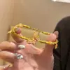 Pulsera de Mariposa Popular de Xiaohongshu, Mariposa Estéreo con Perlas Envueltas en Oro, Joyería Versátil de Gama Alta de Nicho