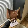 Bolso de mano de moda para mujer 2026 nuevo bolso de hombro con cadena francesa y patrón de diamantes, bolso de axila, bolso tote y bandolera de alta gama, moderno