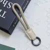 Nuevo Cordón para Teléfono Móvil de Cuero PU Empalmado de Huayang, Cordón para Teléfono Móvil de Cuerda Trenzada Colorida, Correa para Botella de Agua con Llavero