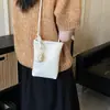 Mini bolsa de nicho transfronteiriça para mulheres, novo modelo 2026, bolsa simples e casual para celular, bolsa transversal versátil estilo coreano da moda