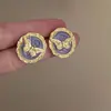 Pintura al óleo mariposa mariposa retro francesa esmalte de gota pendientes de metal lujo ligero sentido de alta calidad diseño de nicho temperamento de hada