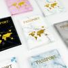 Porta pasaporte con borde único transfronterizo de mármol bronceado, juego de protección para pasaporte multicolor.
