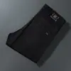Jeans Blancos de Alta Gama Europeos Lyocell Tencel Tres Pruebas para Hombre en Otoño Nuevo Ajuste Delgado Pierna Pequeña Elásticos Casual Tendencia