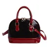 Bolsa Colorida para Mulheres Nova Moda Primavera e Verão 2026 Bolsa de Mão Estilo Retrô concha para Trabalho e Lazer Bolsa de Ombro Único Transversal para Mulheres