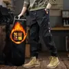 Colección nueva de invierno 2026: Pantalones casuales de forro polar estilo americano para hombre, con un diseño moderno, corte holgado, talla grande y tobillos cónicos