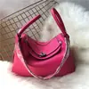 Bolsas de medicina al por mayor bolsas para mujer cuero de capa superior con textura de lichi bolsa de enfermera hombro portátil bolsa Lindi bolsa almohada Europa y Estados Unidos