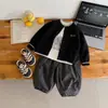 Nuevo Set de Punto para Niños Otoño 2026 Estilo Coreano para Niños Suéter con Cuello Redondo Abrigo Pantalones Anchos Holgados Conjunto de Dos Piezas Moderno