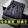 Calças casuais masculinas transfronteiriças inverno mais veludo grosso veludo cotelê calças masculinas comércio exterior soltas perna reta veludo cotelê calças esportivas
