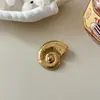 Nueva Colección de Broches de Flor de Acero Inoxidable, Versátiles Broches de Estrella de Mar Exquisitos Europeos y Americanos, Accesorios de Abrigo y Joyería de Alta Gama