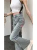Pantalones Pequeños de Cintura Alta Diseño de Otoño Temprano para Mujer Sentido de Diseño Nicho Divididos Forma de Herradura Americana Micro-jeans Pantalones
