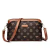 Bolsa pequena com textura de couro macio, estampada, transfronteiriça de Hong Kong, para mulheres, bolsa de mãe vintage 2026, bolsa transversal para mulheres de meia-idade