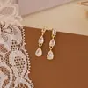 Pendientes de botón con colgante de circonita en forma de gota de luz de lujo transfronterizos europeos y americanos, súper brillantes, elegantes y de alta gama, pendientes de botón con pasador de plata 925 para mujer, de novia